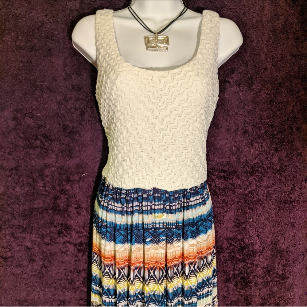 Sleeveless maxi dress, cream top, colorful skirt